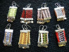 the small beaded items are arranged in rows