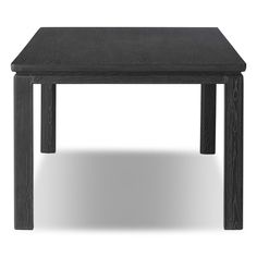 a black table sitting on top of a white floor next to a wooden frame and legs