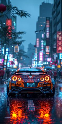 a car driving down a city street in the rain