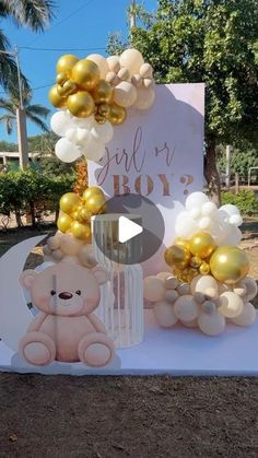 a table topped with balloons and teddy bears