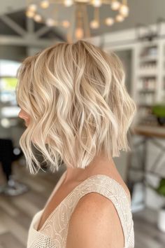 39 Milky Blonde Hair Color Ideas That Will Make You Want to Go Lighter Butter Blonde Hair Short, Creamy Blonde Short Hair, Blonde With Baby Lowlights, Butter Cream Blonde Hair, Blonde Hair For Pale Skin Blue Eyes, Creme Blonde Hair, Short Blonde Hair Round Face, Shadow Root Blonde Short Bob, Vanilla Cream Blonde Hair