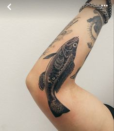 a person with a tattoo on their arm