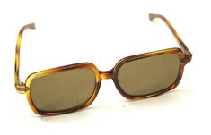 The listing you are viewing is for a Pair of Vintage 1950's Tortoise Look Ladies Sunglasses Size Large. Made In Japan. Keywords:Vintage sunglasses, tortoise shell look, 1950's decor, women's vintage sunglasses, oversized sunglasses, chic 1950's decor.    The item you see is the actual item you are buying, unless there are multiples for sale.We do not break up a multiple item listing for one piece. PLEASE Please please Ask Questions Before Purchasing. We will try to respond quickly. USED or Unspe