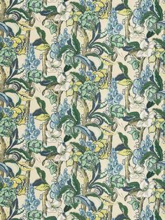 an old wallpaper with blue flowers and green leaves