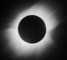 the sun's corona corona is seen in this black and white photo