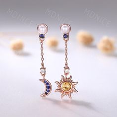 Sun and Moon Dangle Drop Earrings, Birthstone Amethyst Citrine Pearl Sapphire Sun Celestial Earrings, Women Vintage Colorful Gemstone Birthday Gift Details: Earring Total Length: 30.2mm Sun Earrings: round citrine, pearl, moissanite, round blue sapphire Moon Earrings: blue sapphire, pearl,moissanite ❤The main stone can be replaced with other natural or lab gemstones. ❤I can do rush order for you,please contact me about the timeline. ❤Contact me if you need the above custom service. Moon Stone Earrings, Sun And Moon Earrings, Moon Earrings, Moon Stone, Stone Earrings, Gemstone Colors, Citrine, Blue Sapphire, Vintage Ladies