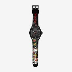 Embrace audacious elegance with the Ed Hardy men's watch, a masterful blend of modern edge and timeless sophistication. Its round matte black case encases a striking black sunray dial adorned with an enigmatic snake print and bold skull-shaped metal alloy accent. Powered by a precise three-hand quartz movement and complemented by a sleek matte black silicone strap with buckle closure, this watch exudes unshakable confidence and style, making it the quintessential accessory for the modern man who Three Hands, Ed Hardy, Black Case, Watch Movement, Snake Print, Modern Man, Quartz Movement, Watch Strap, Matte Black