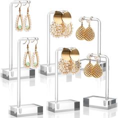 PRICES MAY VARY. You will get 6 pcs acrylic earring display stand in 3 heights: 5", 4.2", 3.5". There are 2 holes on each L-bar, so you can hang 6 pair earrings on these earring stands, the are good for ear studs, dangle earrings. Elegant Acrylic Stand: These clear jewelry retail holder are made of acrylic, strong material and sturdy structure, it is very clear and elegant, ideal for home use or professional jewelry displays in stores or salons. Widely Use: The modern clear design can be well in Earring Display Stand, Clear Jewelry, Bracelet Organizer, Earring Display Stands, Hanging Jewelry Organizer, Bracelets Bangle, Clear Earrings, Acrylic Earring, Gift Shops