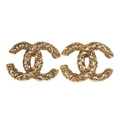 These 1993 Chanel vintage Florentine CC earrings are of 24K gold plated hardware, featuring a hammered-like lava effect and a clip on back closure.Origin: FranceCondition: Vintage; Excellent - These earrings show some discoloration on the backside and near the clip on closure.Accompanied by: Chanel boxMeasurements: 1" x .8" Vintage Chanel Jewelry Dior, Vintage Chanel Earrings, Vintage Chanel Jewelry, Cc Earrings, Chanel Earrings, Chanel Vintage, Chanel Jewelry, Vintage Chanel, Fendi Bags