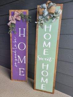 two wooden signs that say home and sweet home