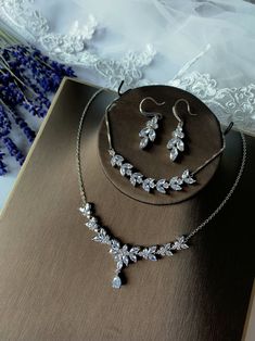 This romantic yet classy jewelry set is suitable for bride, bridesmaid or maid of honor. Elegant and easy to match. Wonderful for engagement party, anniversary, evening events, date night, graduation ceremony, mothers gift, baby shower, minimalist wedding or any special occasions etc. Want another combination or color? send me a message! ♥Lead and nickel free ♥Made from shinny and high-quality cubic zirconia crystal  ♥Timeless design ♥Extra long chain available ♡JEWELRY DETAILS♡ 【Earrings】 Size Elegant Jewelry Sets With Matching Earrings For Bridesmaids, Elegant Bridal Sets With Matching Earrings For Wedding, Elegant Bridal Sets With Matching Earrings, Silver Jewelry Sets For Bridesmaids, Elegant Jewelry Sets For Bridesmaids, Delicate Wedding Jewelry Sets With Matching Earrings, Elegant Silver Bridal Accessories For Bridesmaids, Baby Shower Minimalist, Shower Minimalist