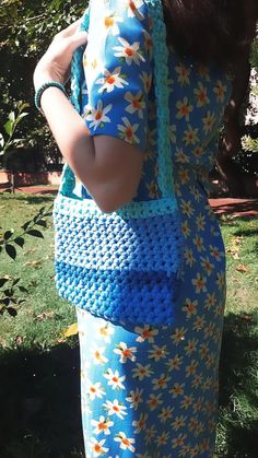 This handmade crossbody bag in various shades of blue evokes a serene seaside ambiance. Crafted with care, it features intricate crochet patterns that mimic the beauty of ocean waves. Lightweight and stylish, it's perfect for beach outings or casual strolls, offering ample space for your essentials. This charming accessory beautifully captures the essence of coastal living, making it a must-have for anyone looking to embrace a maritime vibe. Shoulder Bag Crochet, Handbag Crochet, Crochet Colorful, Blue Crossbody Bag, Intricate Crochet, Crochet Shoulder Bag, Crochet Handmade, Bag Crochet, Crochet Handbags