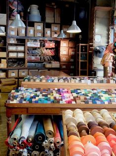 the inside of a store filled with lots of different colored items