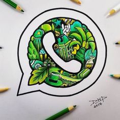 a drawing of the letter q with green leaves and flowers in it, surrounded by pencils