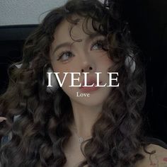 a woman with long curly hair is looking at the camera and has words written on her face