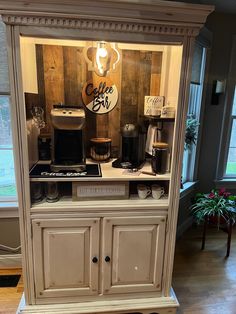 an old fashioned coffee machine is on display