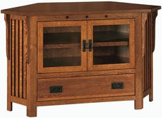 a wooden cabinet with two doors and drawers