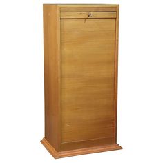 a tall wooden cabinet sitting on top of a white floor