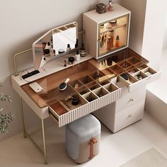 an open vanity with drawers, mirror and stool