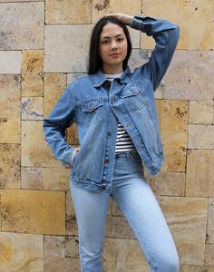 Vintage blue jean jacket in a mid wash denim. Boyfriend style. Two chest pockets. Size medium, UK 10-14 / EU 38-42. Measurements - 40"(102cm) bust - 26"(66cm) sleeve length - 25" (64cm) jacket length. Material - Denim. Condition - Good, wear to arm as shown . Handpicked, repaired and ready to wear. This is an original vintage item, not new and minor signs of wear & age are expected, we will highlight any major flaws. Model is a UK 6/8 and is 5'7" tall Light Wash Relaxed Fit Denim Jacket In Recycled Denim, Light Wash Relaxed Fit Recycled Denim Jacket, Relaxed Fit Light Wash Recycled Denim Jacket, Relaxed Fit Medium Wash Recycled Denim Jacket, Fall Medium Wash Recycled Denim Jacket, Relaxed Fit Denim Jacket In Recycled Denim, Relaxed Fit Medium Wash Denim Jacket, Dark Wash Relaxed Fit Denim Jacket, Spring Medium Wash Recycled Denim Jacket