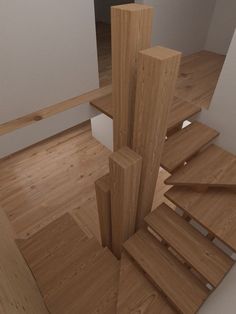 a wooden stair case in an empty room