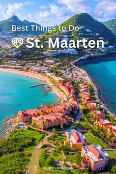 an aerial view of st maarten with the ocean and mountains in the background