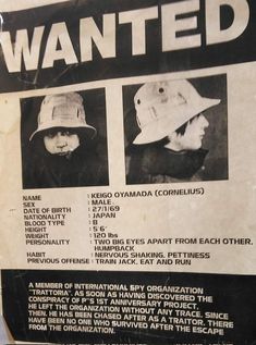 a wanted sign posted on the side of a building with two images of people wearing hats