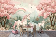 a child's room with pink trees and unicorns on the wall