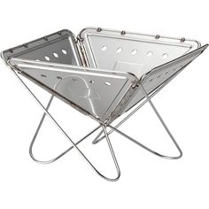 two metal trays with holes on each side and one holding a magazine rack for magazines