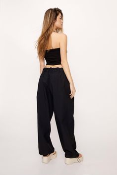 Turn the volume up. Pair with a crop top, and sneakers for a bold take on laidback style. Extreme Parachute Multi Wear Cargo Pants Wide Leg Design Wear High or Low Rise Elasticized Waistband Tie Front Detail Eyelet Accents Toggles on Ankles Relaxed Fit Seam Pockets Comfortable Woven Fabric Model wears size M (US size 6/UK size 10). Feel the music - it's time to shop festival outfits. Keep it cute in boho clothing or hit the pit in rave outfits designed to thrill. We'll see you backstage. Cargo Pants Wide Leg, Feel The Music, Laidback Style, Oasis Fashion, Leg Design, Pants Wide Leg, Laid Back Style, Rave Outfits, Linen Dresses