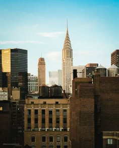 the skyline of new york city is seen in this image