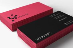 two business cards sitting side by side on top of each other, one with the word unifescop printed on it