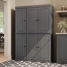 a large gray cabinet sitting in the corner of a room