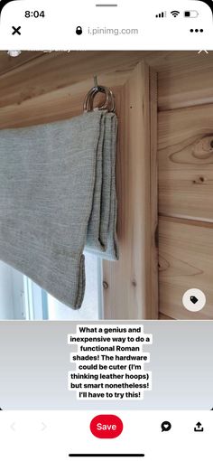 an image of a window with a curtain pulled up to it's side and the words, what a genius and functional roman blind