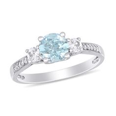 Honor your everlasting love with this gemstone and diamond engagement ring. Fashioned in cool 10K white gold, this irresistible design showcases a 6.0mm icy-blue aquamarine flanked by a duo of 3.0mm lab-created shimmering white sapphires. Glistening diamonds line the lightly tapered shank. Captivating with 1/20 ct. t.w. of diamonds and a brilliant buffed luster, this engagement ring is certain solidify your future together. Light Blue Rings Engagement, Blue Diamond Engagement Rings, Zales Engagement Rings, Three Stone Engagement Ring, Jared The Galleria Of Jewelry, Aquamarine Engagement Ring, Diamond Engagement Ring Set, Stone Engagement Ring, Three Stone Engagement