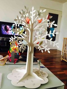 a paper tree is sitting on a table