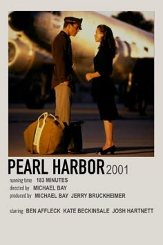 a man and woman standing next to each other in front of an airplane with the words pearl harbor on it