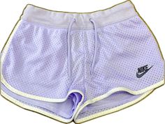 Nike Sporty Beach Shorts, Nike Athleisure Summer Shorts, Nike Summer Athleisure Shorts, Nike Athleisure Shorts For Summer, Casual Purple Athletic Shorts, Purple Sporty Shorts For Spring, Nike Summer Shorts, Nike Casual Athletic Shorts For Summer, Casual Nike Athletic Shorts For Summer