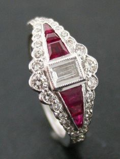 About the Product : Type : Ring Metal : 925 Sterling Silver/10k/14k/18k Gold Main Stone : Ruby Main Stone Shape : Emerald Cut Main Stone Color : Red Main Stone Creation : Lab Grown Side Stone : Cubic Zirconia Side Stone Shape : Baguette, Round Side Stone Color : White Cut : Excellent Hallmark Stamp : YES, Stamped According to metal Country Of Manufacture: India Condition: Brand New, Never been Used Sizing: Any size from US 4 To 14 All Middle Ring Size Available SKU : CPRI080 🎁 Beautiful Gift Bo Diamond And Ruby Ring, Bijoux Art Deco, Art Deco Sapphire Ring, Casual Chique, Jewelry Beautiful, Emerald Cut Diamond, Expensive Jewelry, Ruby Jewelry, Deco Jewelry