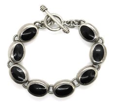 (eBay) Vintage Mexico 925 Sterling Silver Oval Black Onyx Link Toggle Bracelet Cool Etsy Finds, Silver Vintage Jewelry, Black Adjustable Vintage Bracelet, Vintage Oval Link Metal Bracelet, Vintage Adjustable Black Bracelet, Oval Silver Onyx Jewelry, Weird Clothes, Silver Jews, Vintage Silver Onyx Jewelry