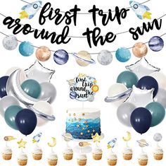 the first trip around the sun with balloons, cake and cupcakes on it