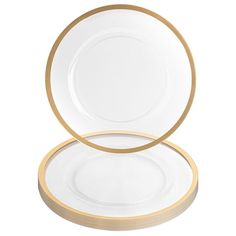 two white plates with gold rims are stacked on top of each other, one is empty