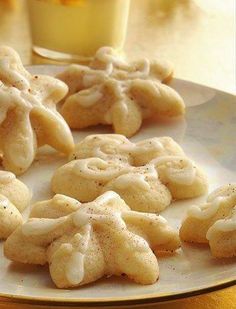 some cookies are sitting on a white plate