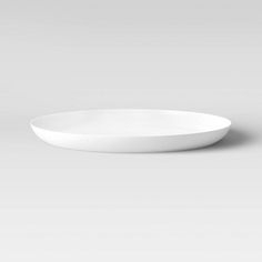 a white plate sitting on top of a table