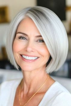 Save this pin for the best short haircuts for older women with fine hair. This chic silver style brings a touch of sophistication with a side part that adds volume and creates an asymmetrical effect. The length is perfect for easy maintenance. Chin Length Straight Hair, Hair Refresh, Short Haircuts For Older Women, Chin Length Cuts, Chic Short Haircuts, Haircuts For Medium Length Hair, Short Hair Lengths