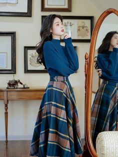 A navy high-neck sweater and brown plaid skirt have a retro feel. The knit fabric is thick and secure, and the fluffy sleeves are romantic. The skirt is made of luxurious fabric, and you will be captivated by the dancing silhouette.     <What is included in your order>     skirt   sweater        <Size>     S size     skirt     Total length: 77cm   Waist: 66cm      sweater     Length: 57cm   Shoulder width: 55cm   Bust: 82-120cm   Waist: 70-96cm   Sleeve length: 46cm         M size     skir Light Academia Skirt, Library Outfits, Plaid Skirt Set, Deer Doll, Retro Skirt, Academia Fashion, Plaid Outfits, Skirt Maxi