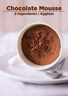 chocolate mousse in a white bowl on a plate