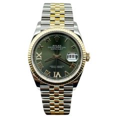 Style Number: 126233 Serial: 233254*** Year: 2019 Model: Rolex Datejust Case Material: Stainless Steel Band: 18K Yellow Gold & Stainless Steel Bezel: 18K Yellow Gold Dial: Original Olive Green Roman Numerals Dial with VI and IX Diamond Markers Face: Sapphire Crystal Case Size: 36mm Includes: -Rolex Box & Paper -Certified Appraisal -5 Year Factory Warranty from Original Purchase Date SKU 20586 / 132850TCF101123 Rolex Green, Green Face Rolex Women, Rolex Olive Green Dial, Rolex Day Date Green Dial, Paper Diamond, Rolex Day Date 36 Yellow Gold, Stainless Steel Band, Roman Numerals, Rolex Datejust