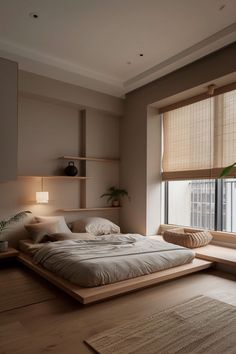 a large bed sitting in the middle of a bedroom next to a window with blinds