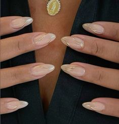 Nude base nails with golden streaks and wavy stripes #fallnails #nails #trendy #nailart Nice And Gold Nails, Prom Elegant Nails, Very Elegant Nails, White Gold Prom Nails, Simple Gold Accent Nails, Cream And Gold Nails Acrylic, Gold Nail Aesthetic, Nude Almond Nails With Gold Design, Nail Inspo For Gold Dress